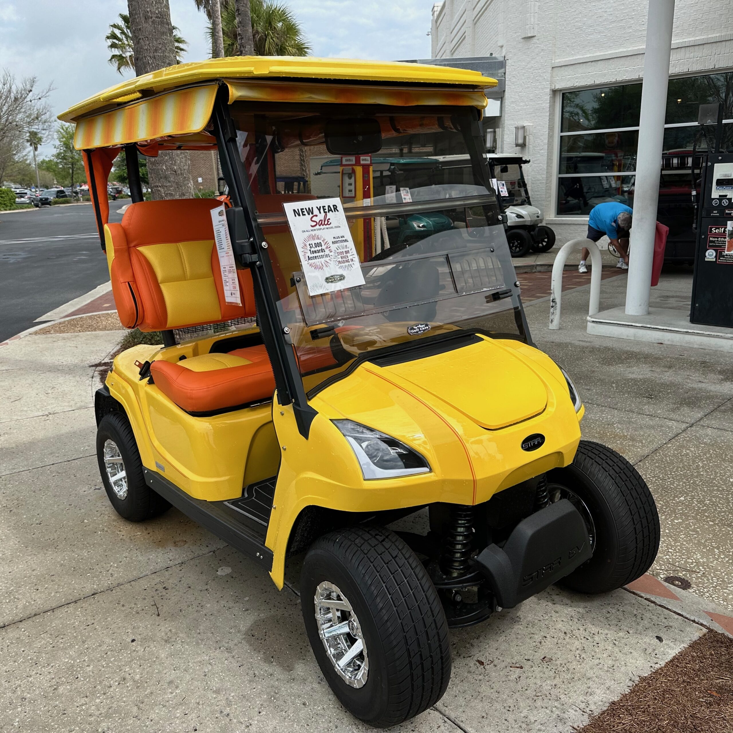 Golf cart adapted for limited on-road transportation